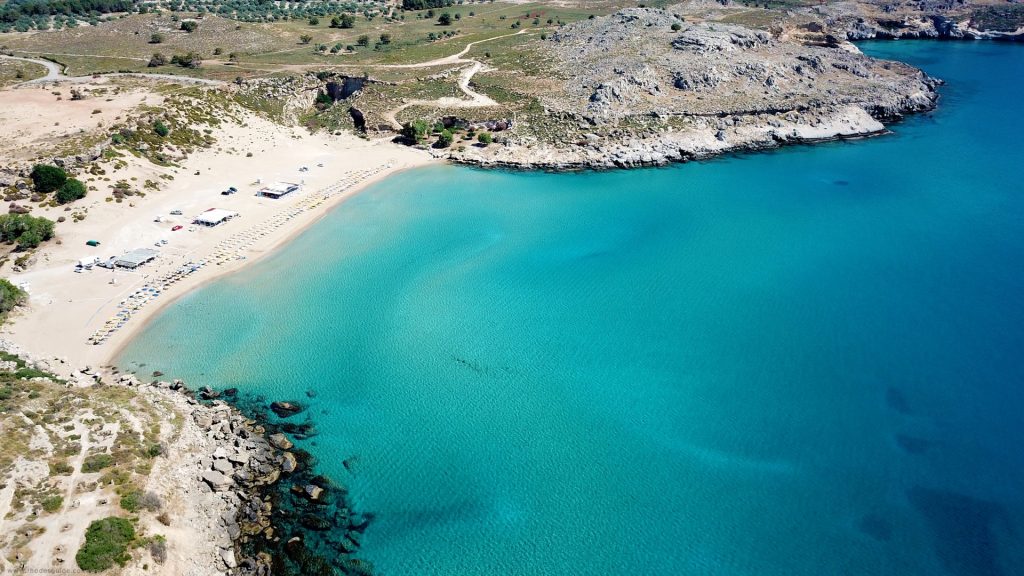 Agathi Beach with golden sand and turquoise water in Rhodes